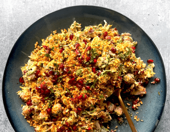 A bowl of shredded sprout slaw
