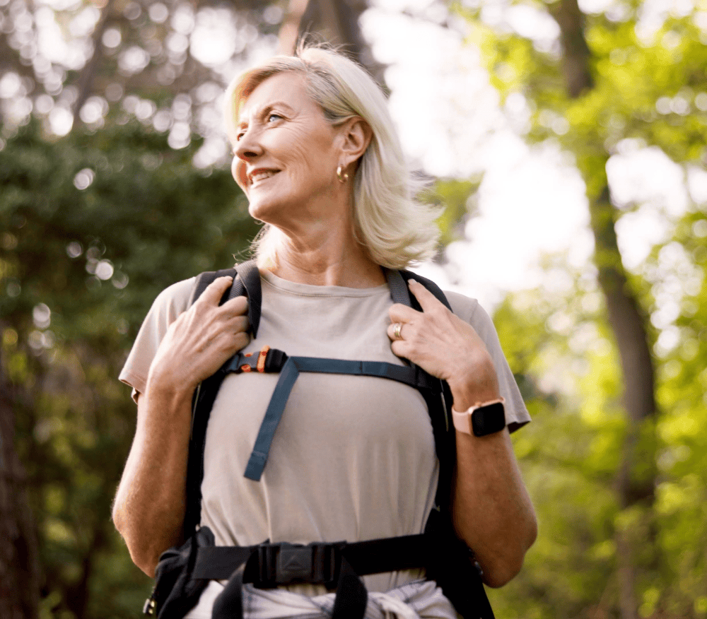 Woman walking outdoors in the sunlight