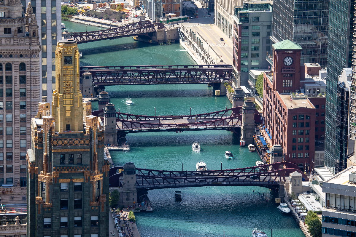 A colourful city with bridges and boats