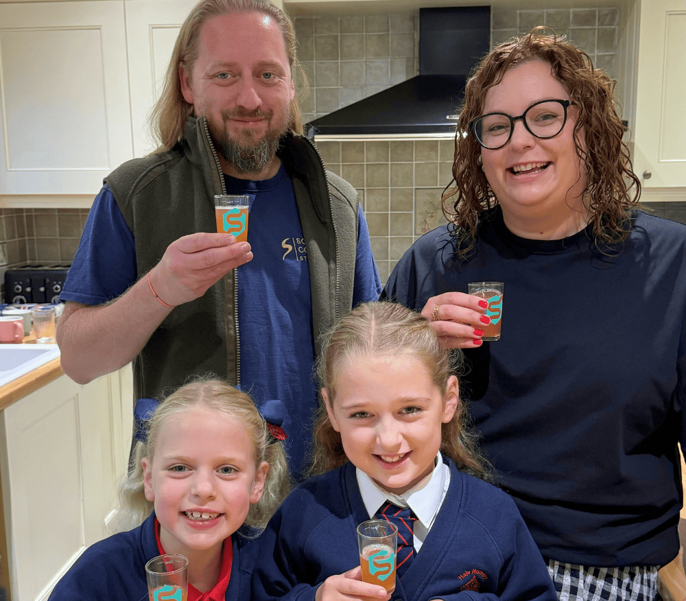 Megan and family with their Symprove shots