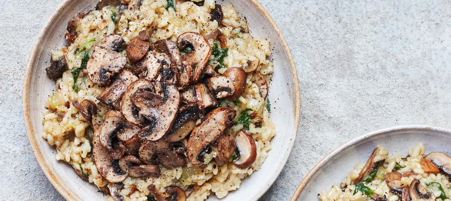 Easy Mushroom Risotto in a bowl on a white kitchen countertop