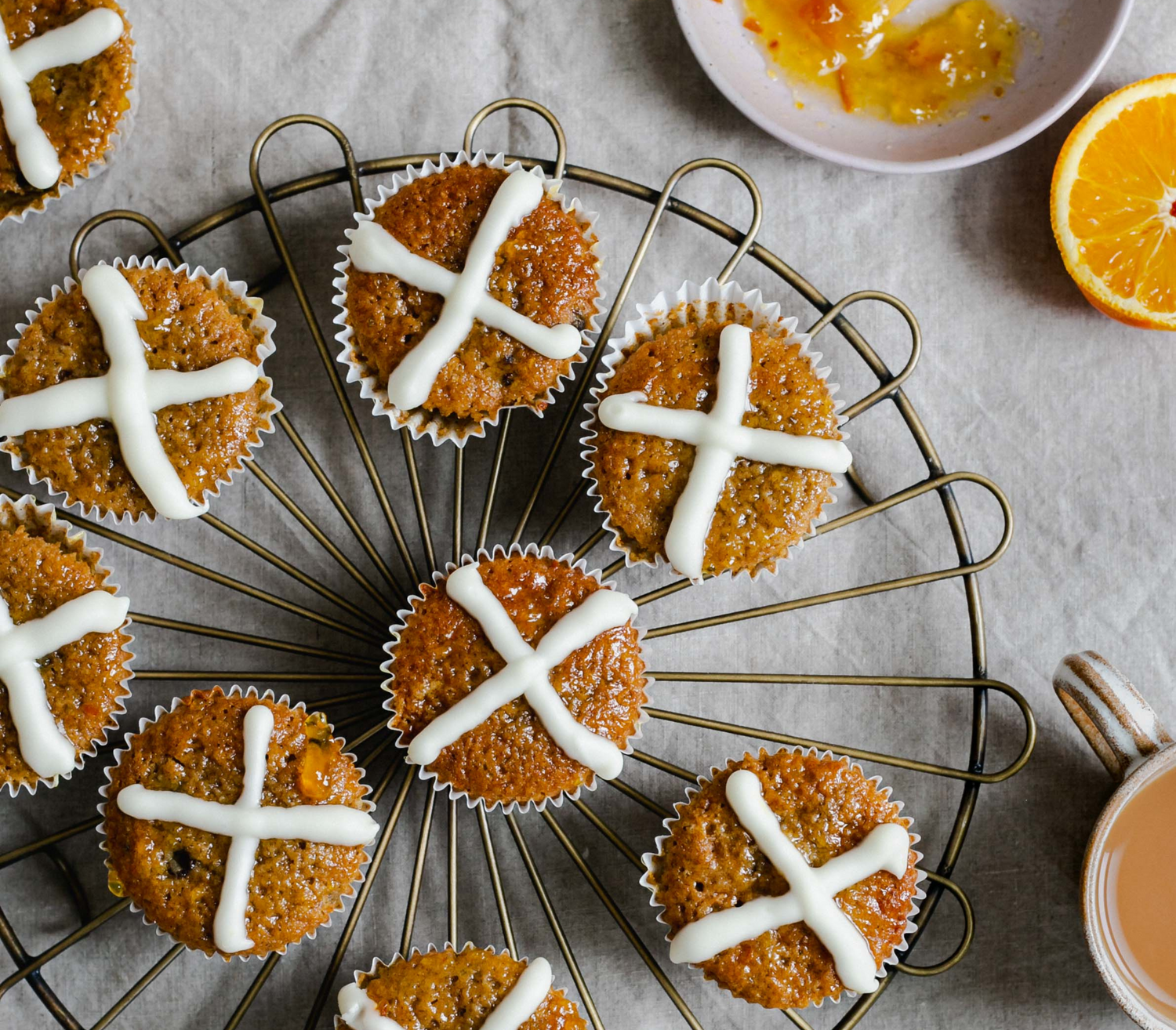 Gluten Free Hot Cross Bun Muffins on a cooling tray