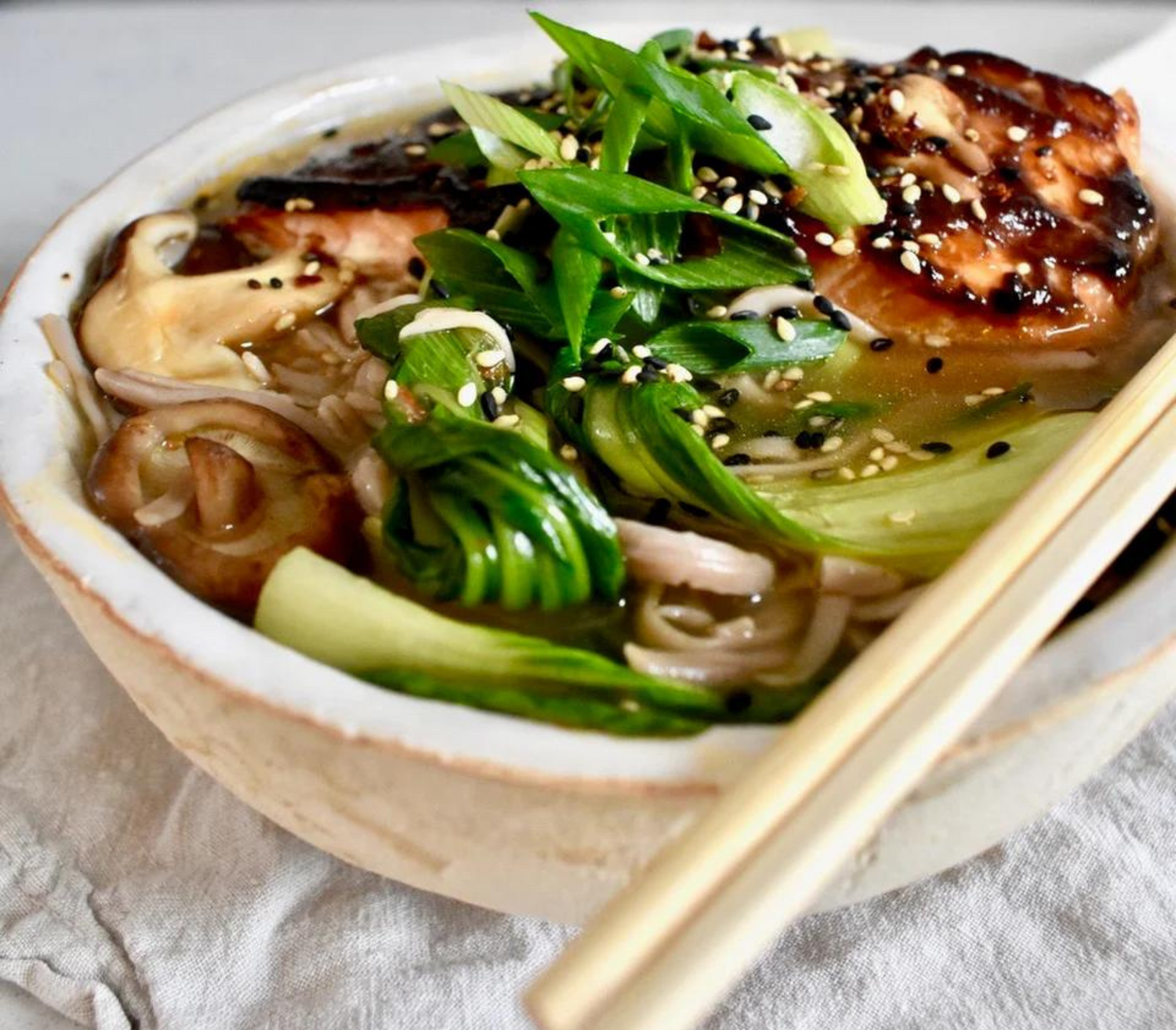 Miso & sesame salmon spicy buckwheat ramen with pak choi and shiitake